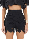 Paula Fashion House black high-waist shorts with floral cutwork and scalloped hem