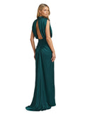 Paula Fashion House emerald green satin gown with open back, high neckline, and ruched detailing.